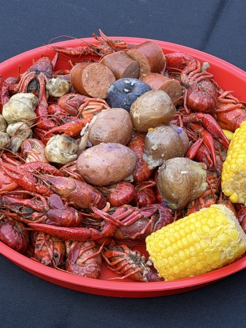Friends sharing food at a fundraiser